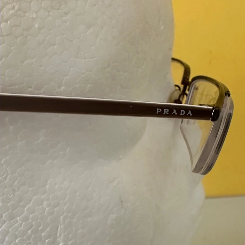 Prada Sleek Bronze Titanium Frameless Rectangular Prescription Glasses Frame